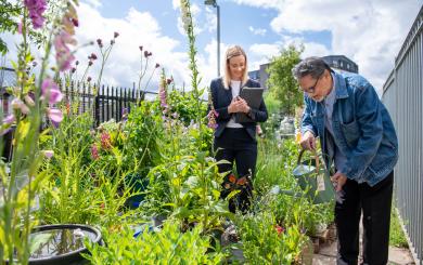 Housing Officer Janine Pulling with resident Rana Jude at Anderston allotments