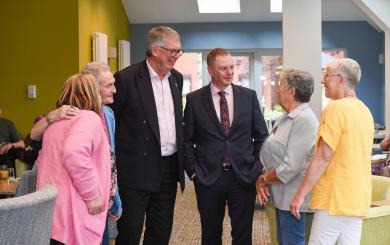 Andrew Manning-Cox and Craig Moule chatting with JJH residents