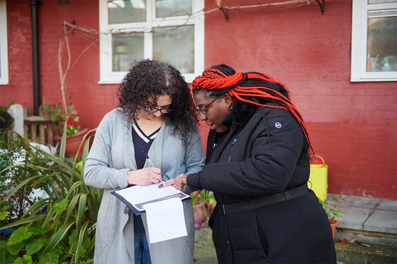 Sanctuary Housing Officer gathering feedback from a resident Sanctuary Housing Officer gathering feedback from a resident