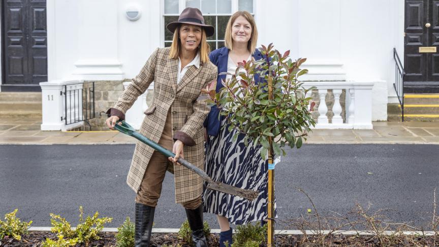 Helen Grant MP and Lizzie Hieron planting trees Helen Grant MP and Lizzie Hieron planting a small tree