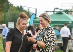 Housing Officer Sarah Strawson talks to a resident at a Customer Focus day in Ely, Cambridge